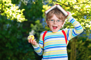 Featured Image for funny boy with book on head