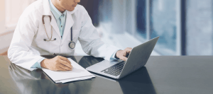 Featured Image for Doctor on laptop taking notes