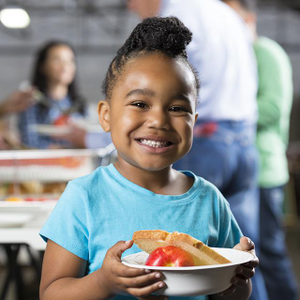 Featured Image for Young black girl with healthy food