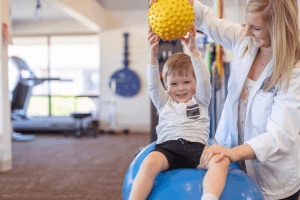 Featured Image for young boy with physical therapist