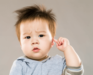 Featured Image for baby boy touching ear