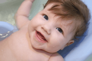 Featured Image for smiling baby in tub