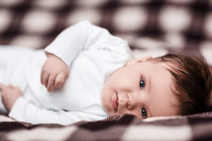 Featured Image for newborn baby laying down