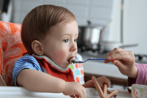 Featured Image for baby feeding with a spoon