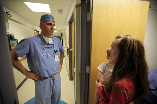 Dr. Milo talks to Pollocks before surgery