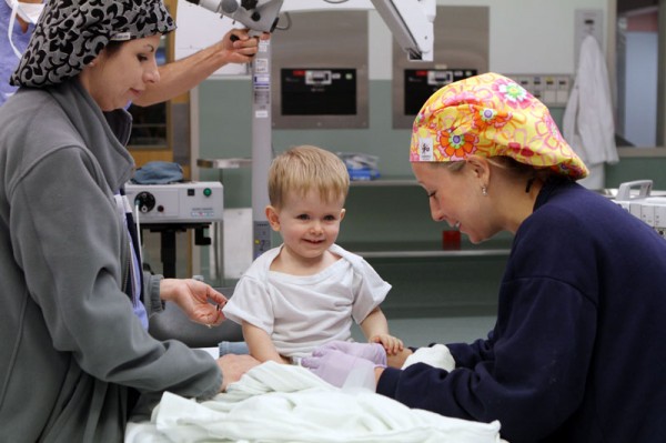 With the help of nurses Sarah Froman and Melanie Stoops, Jordan feels right at home in the OR.