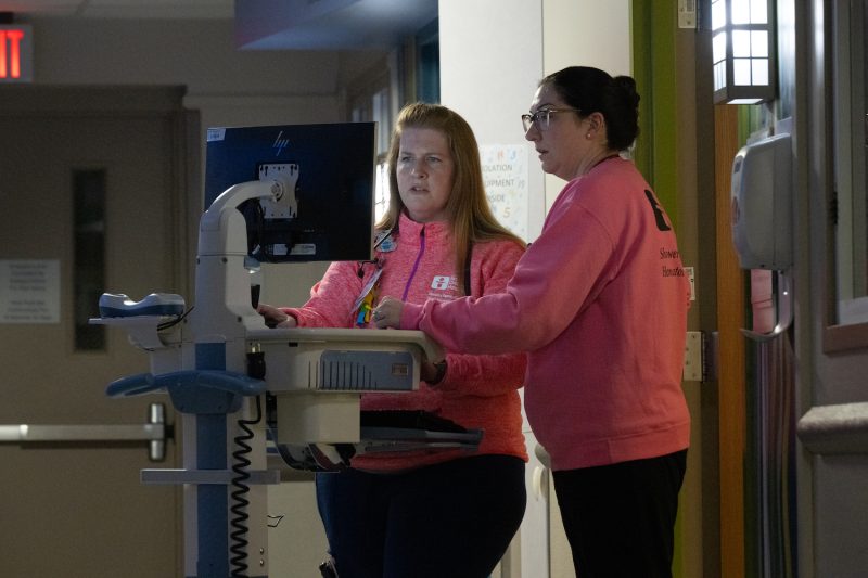 Pediatric nurse practitioners Annie Smith and Lauren Niehaus on the hematology-oncology unit