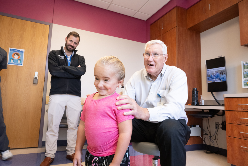 Dr. Schrader with his patient, Annie Taggart.